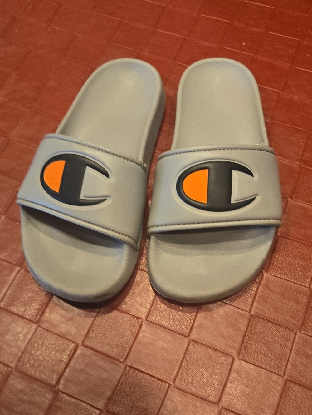 Champion Light Gray Slide Sandals with Orange Logo Accent